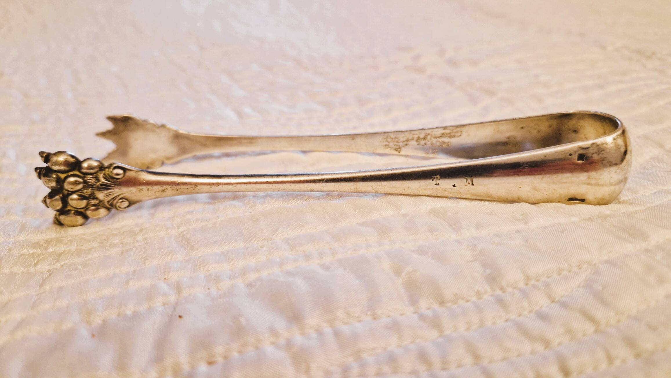 Silver-plated sugar tongs by Cristofle