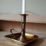 Antique metal and brass hand candle holder on rectangular base
