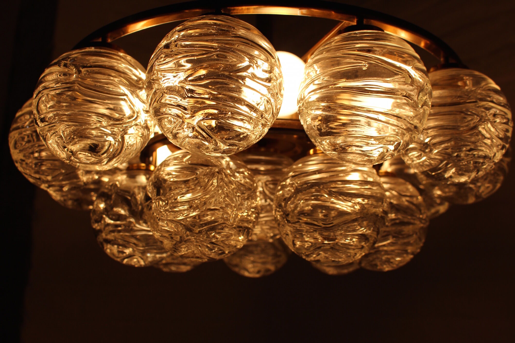 Brass chandelier and glass globes