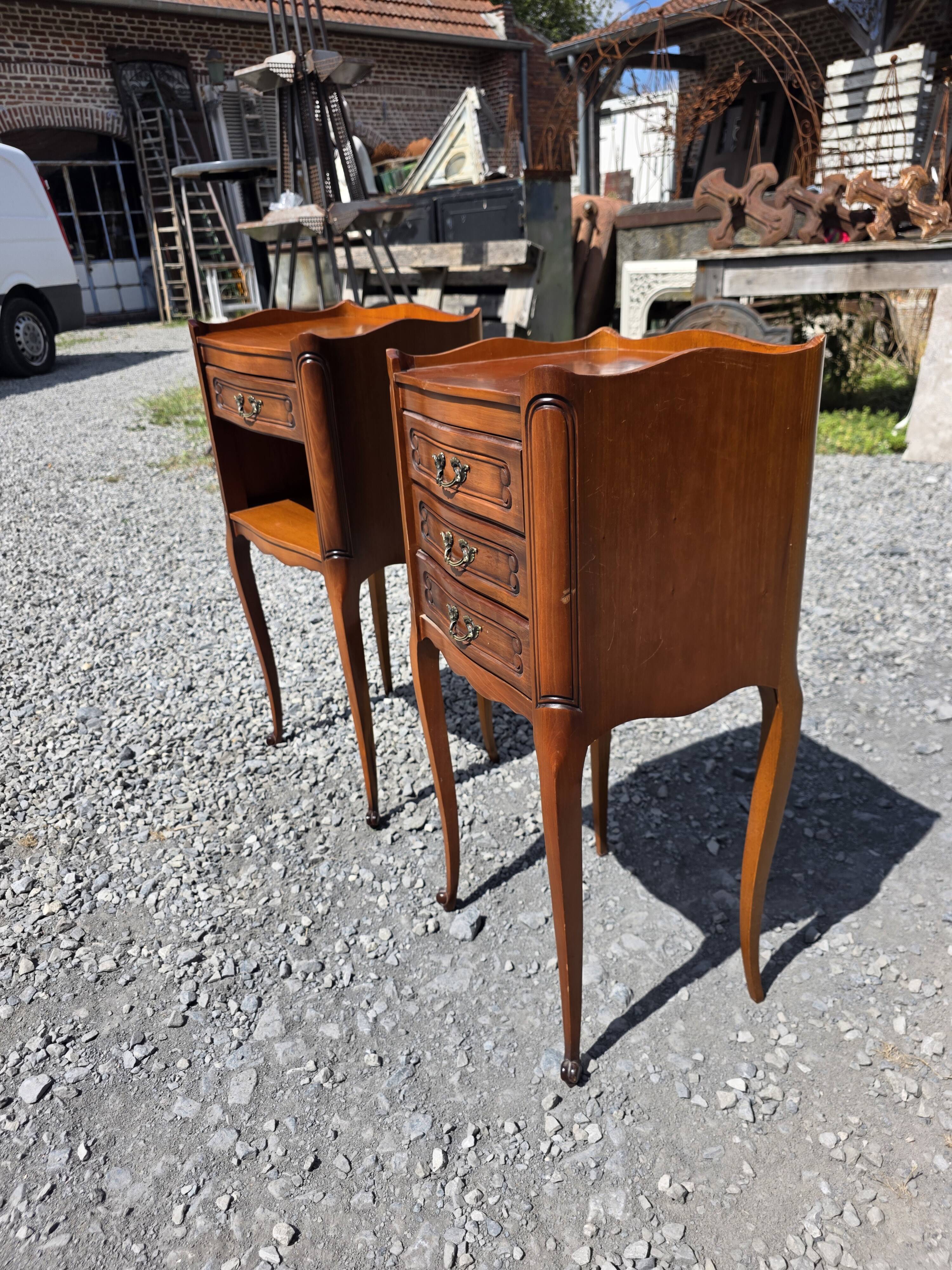 Pair of Louis XV style bedside tables in cherry wood.