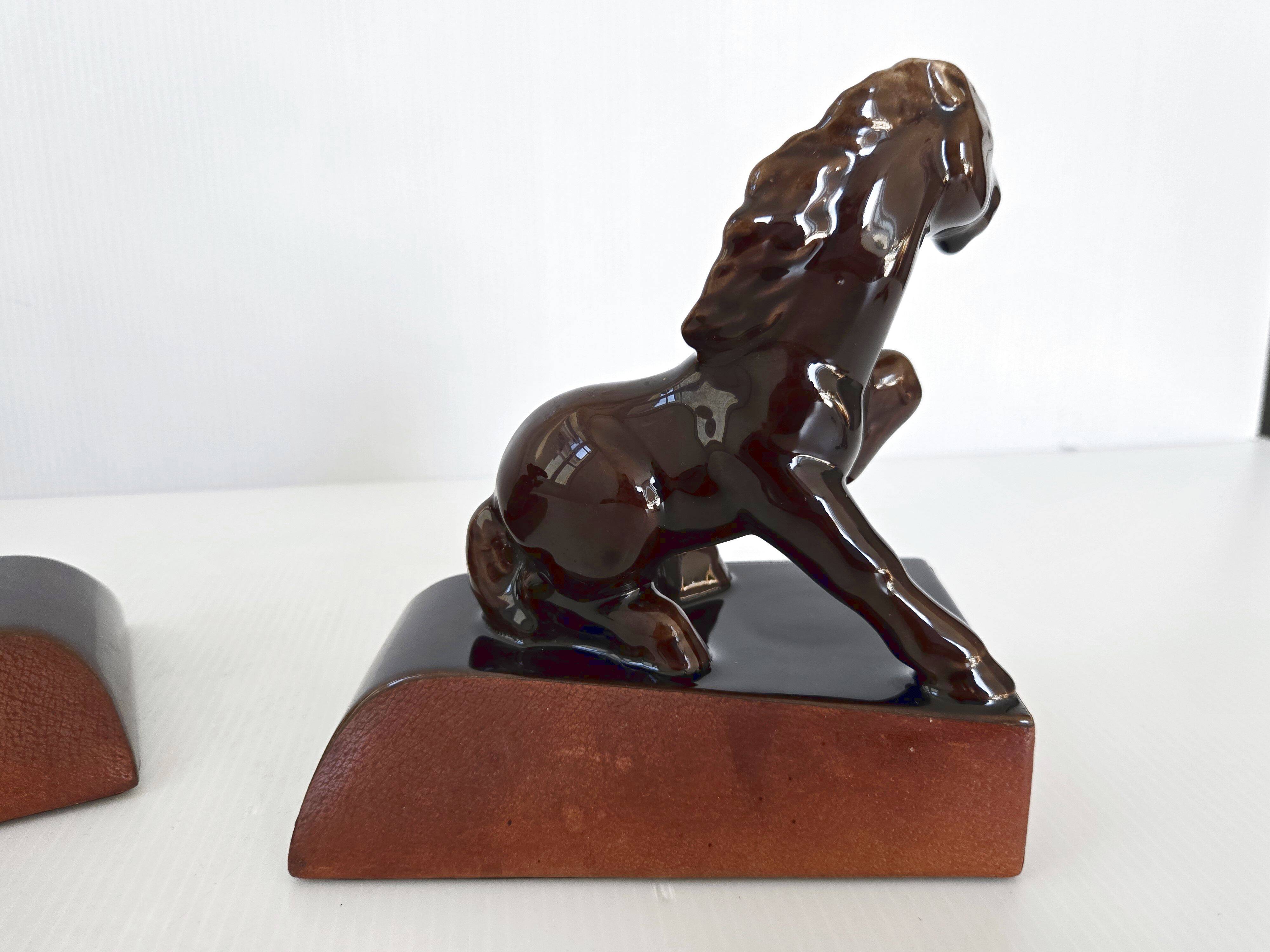 Pair of vintage leather & ceramic bookends