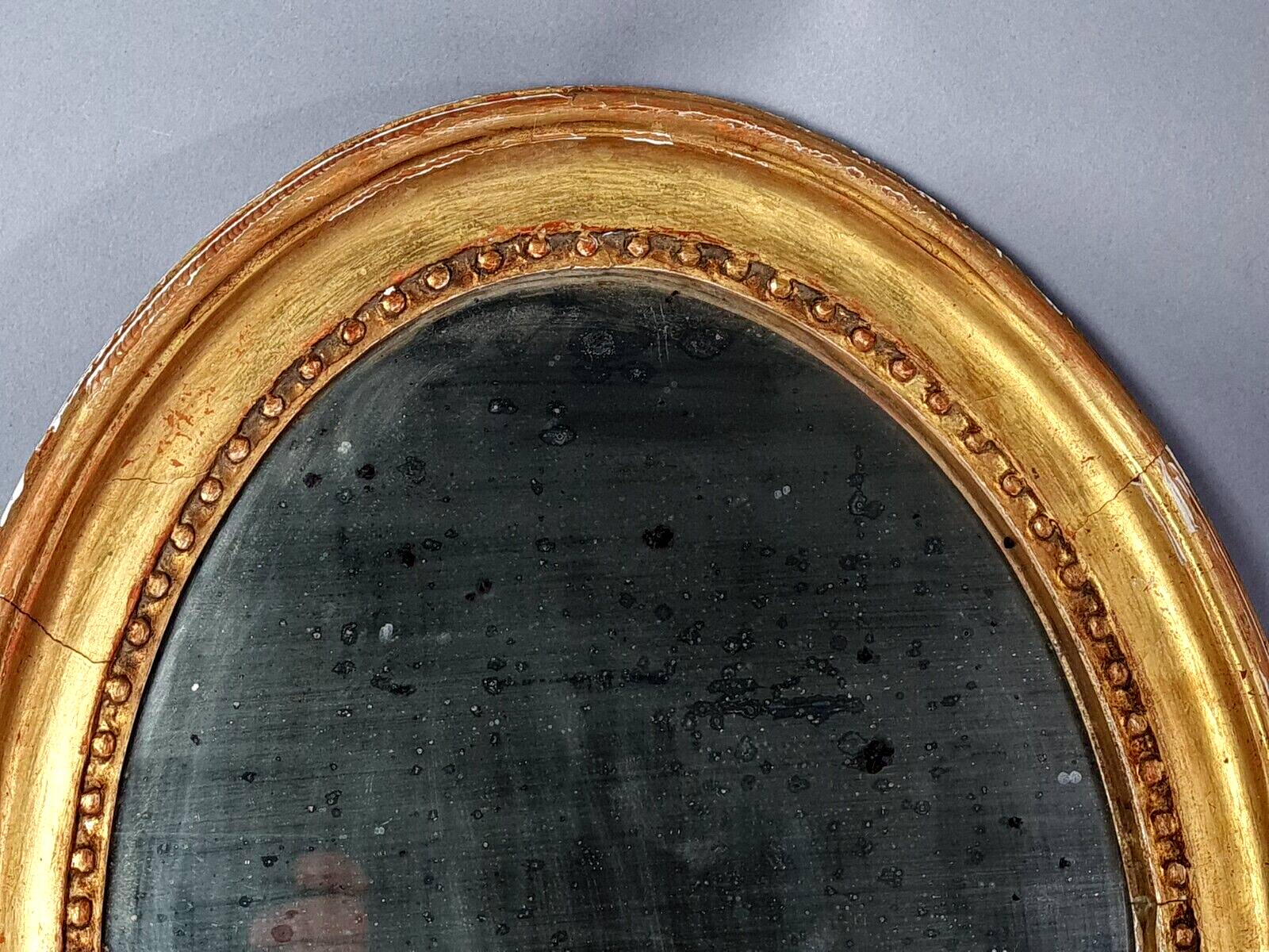 Oval mirror carved wood frame beaded gilded circa 1800 44x35cm SB