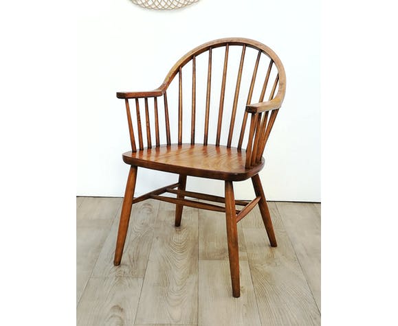 Wooden armchair with bars