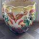 Earthenware cache-pot from the early 20th century.