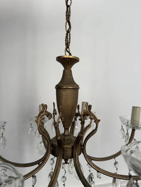 Brass chandelier with crystal drops