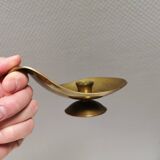 Brass candlestick for a single candle