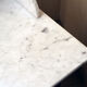 Vintage vanity toilet furniture with marble top.