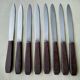 Set of 8 vintage stainless steel and brown bakelite table knives