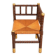 Fireplace corner chair in Louis XIII style, turned wood with braided rush, 19th century.