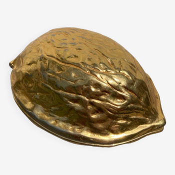 Casse noix en métal doré