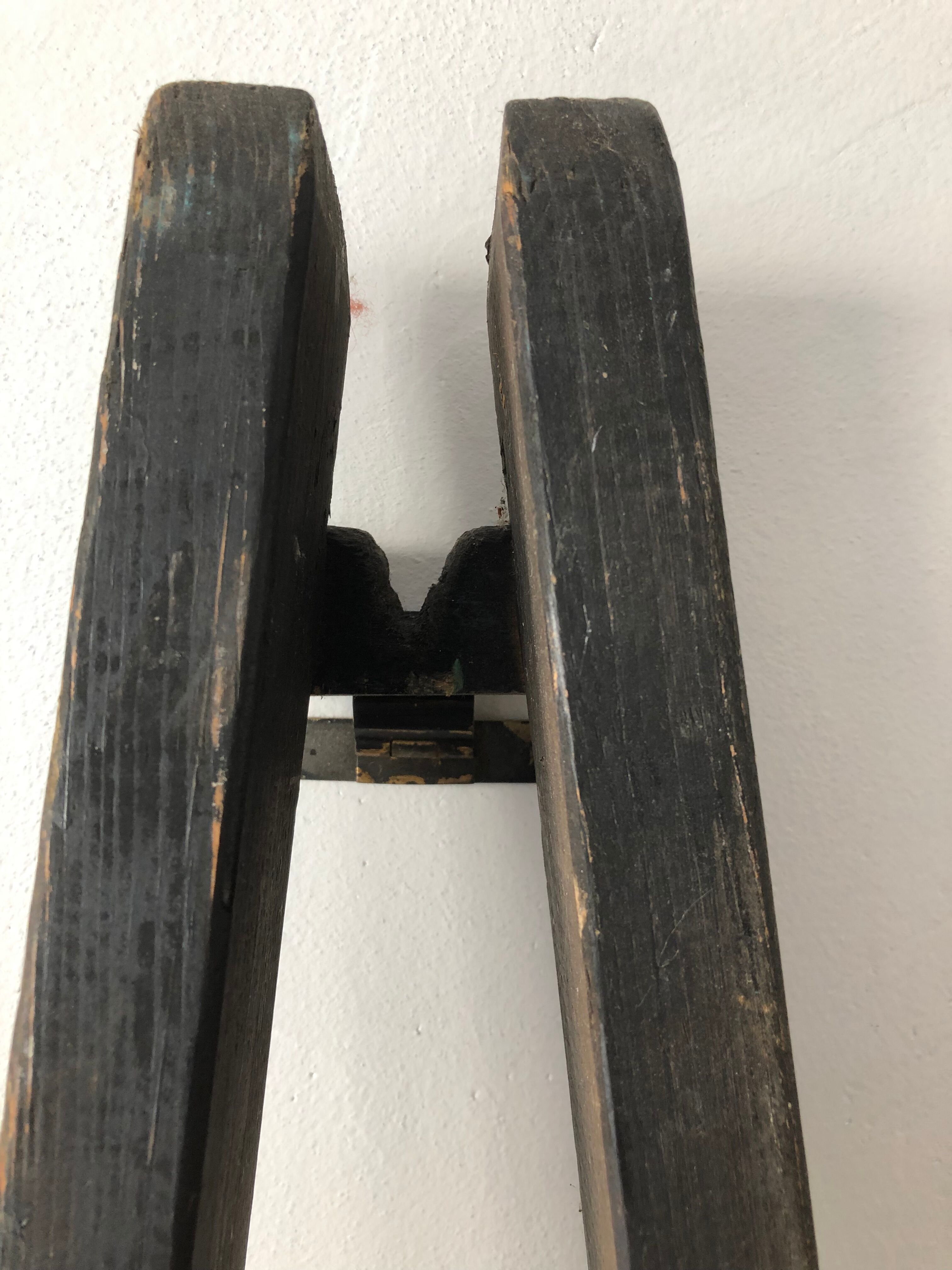 Old stepladder to be fixed to the wall