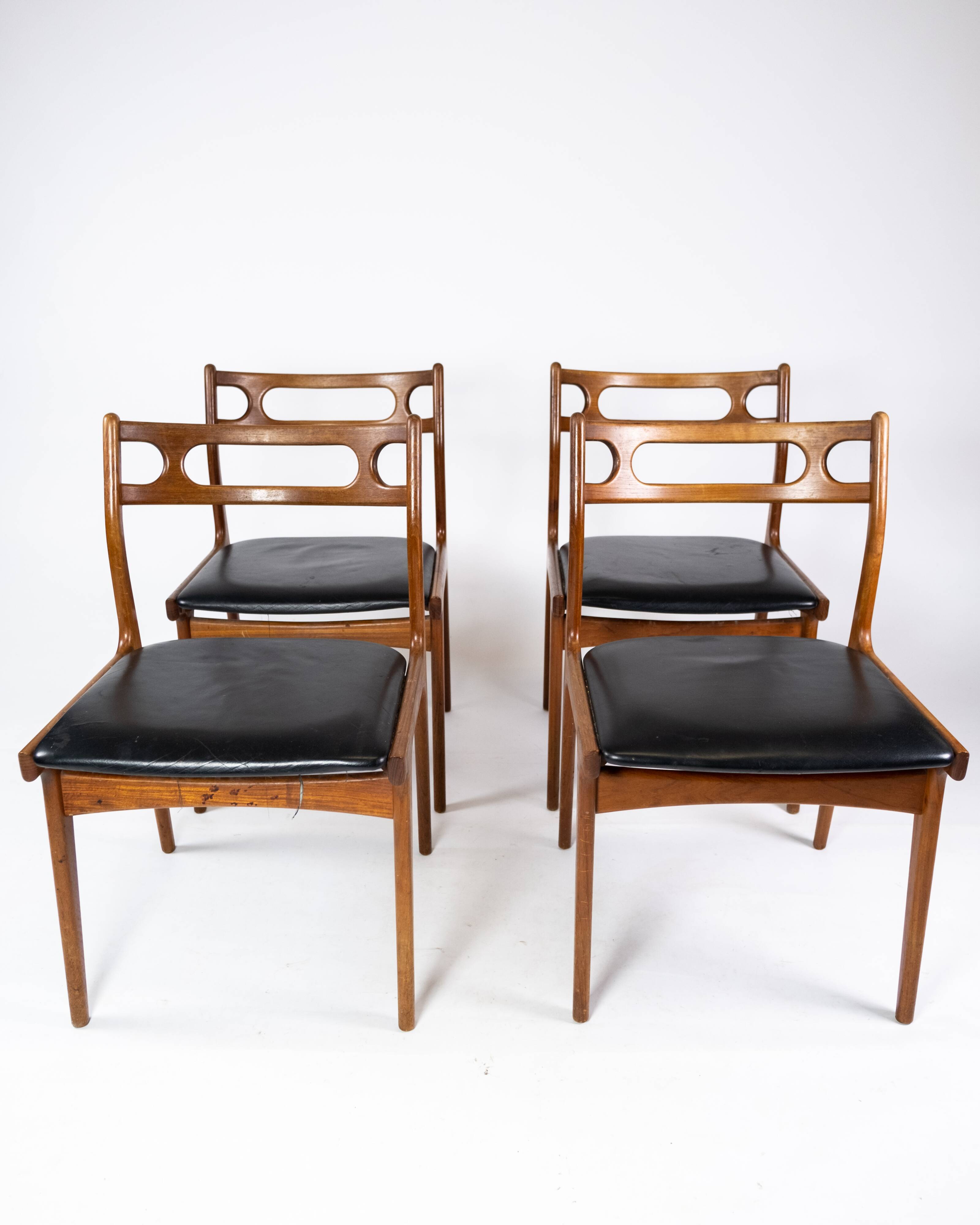A set of four dining room chairs of teak of danish design, 1960s