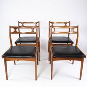 A set of four dining room chairs of teak of danish design, 1960s