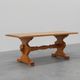 20th Century French oak trestle table with scalloped legs and plank top