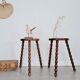Pair of old wooden tripod stools