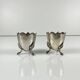 Paire de coquetiers anciens tripodes en maillechort, style Art Nouveau, vers 1900-1925