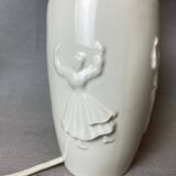 White ceramic table lamp with half lampshade