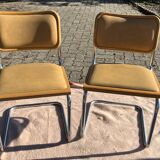 Pair vintage sled reception chairs