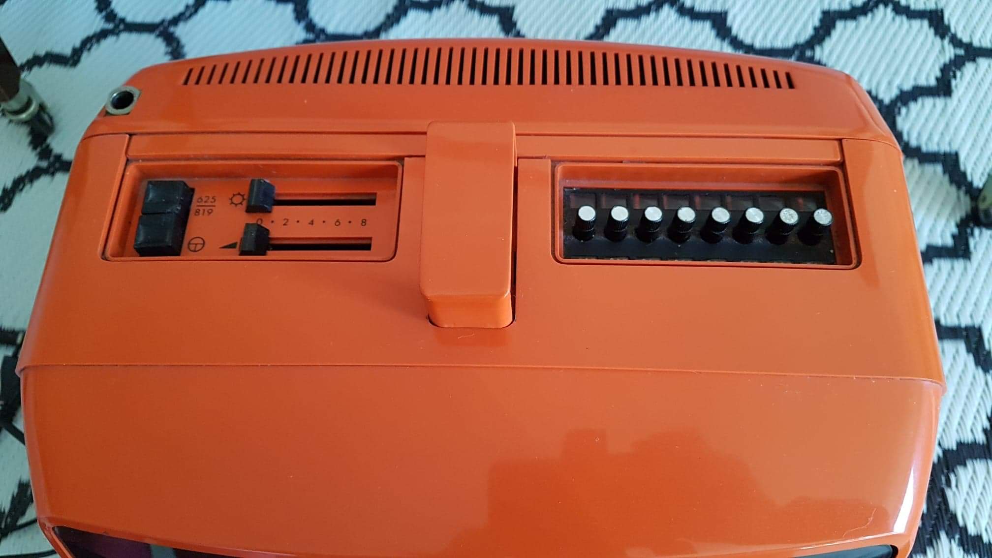 Vintage orange Prince portable TV