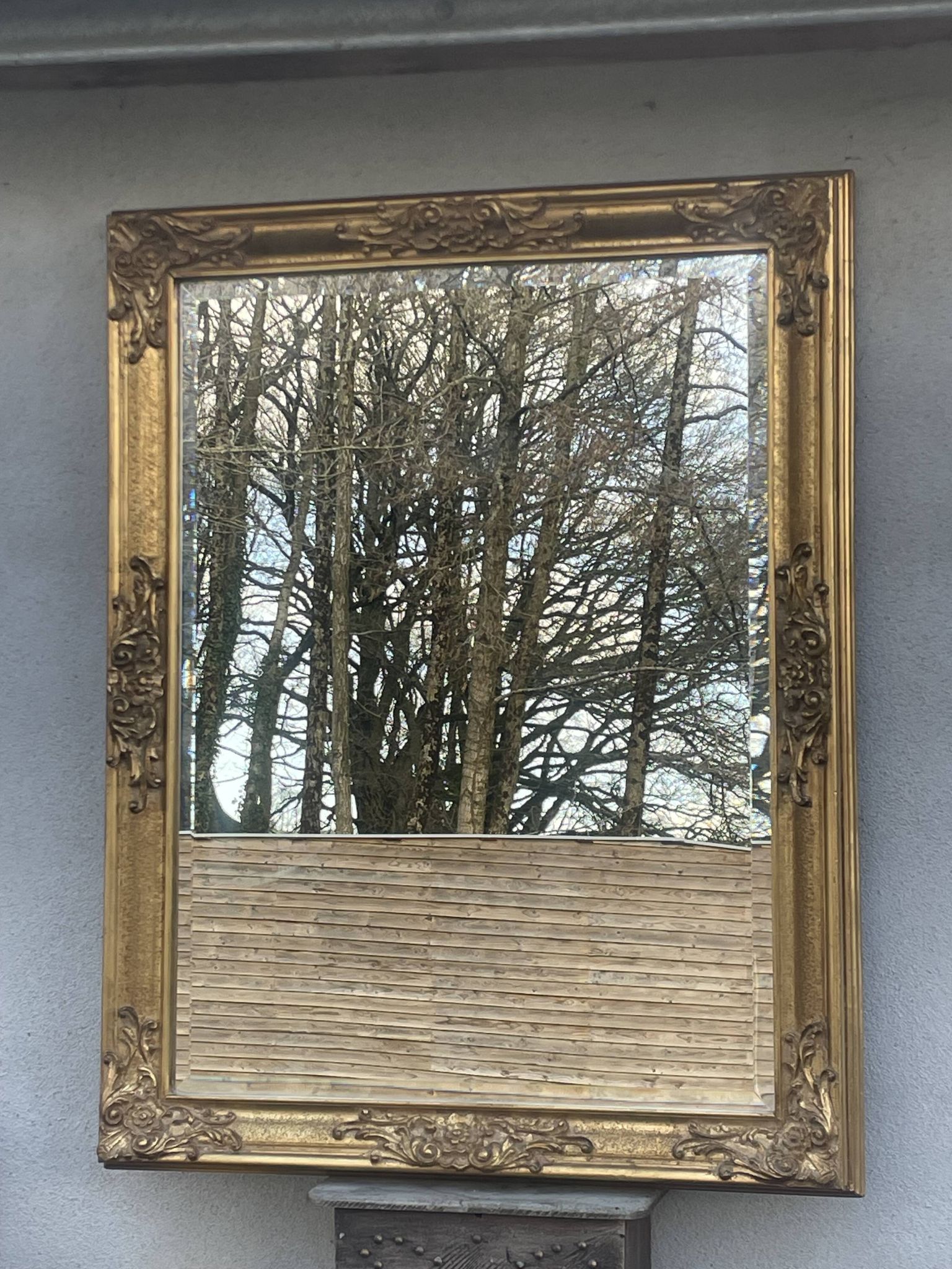 vintage bevelled mirror in rectangular shape, stucco and gilded wood in Louis XV baroque style