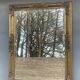 vintage bevelled mirror in rectangular shape, stucco and gilded wood in Louis XV baroque style
