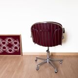 Dark red leather hairdresser's chair