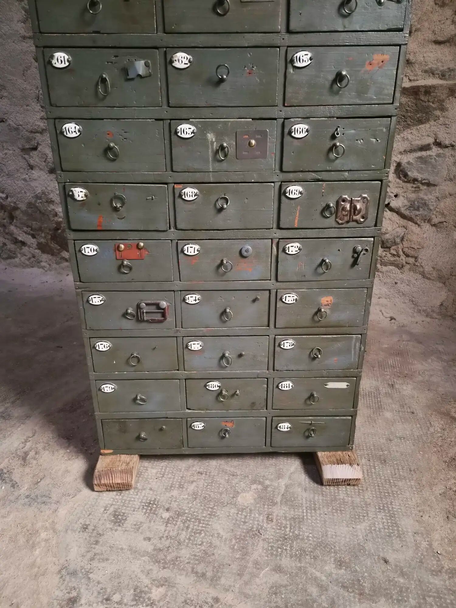 Antique hardware cabinet with 48 drawers, circa 1900.