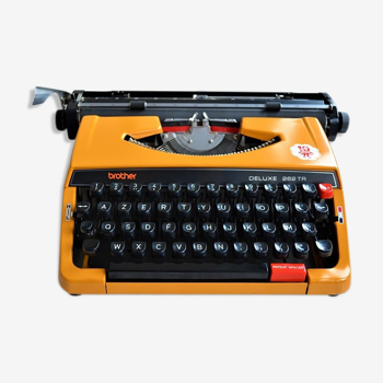 Brother deluxe 262tr orange mechanical typewriter