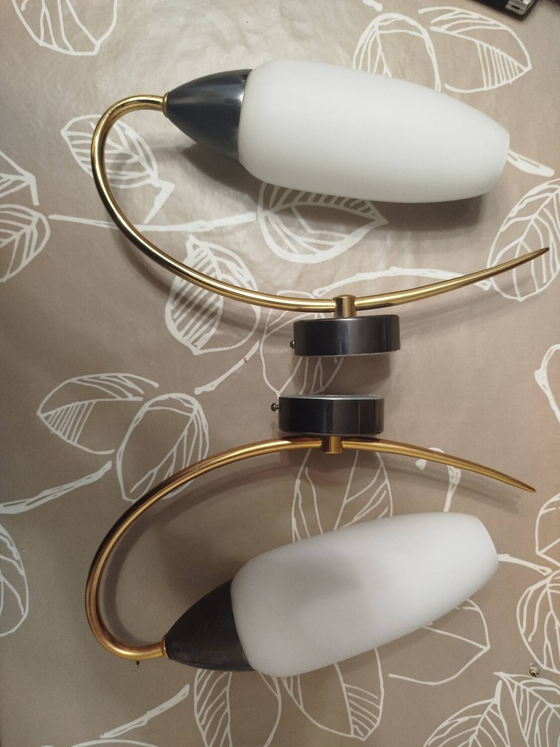 Minimalist wall sconces in opal white glass from the 1990s.