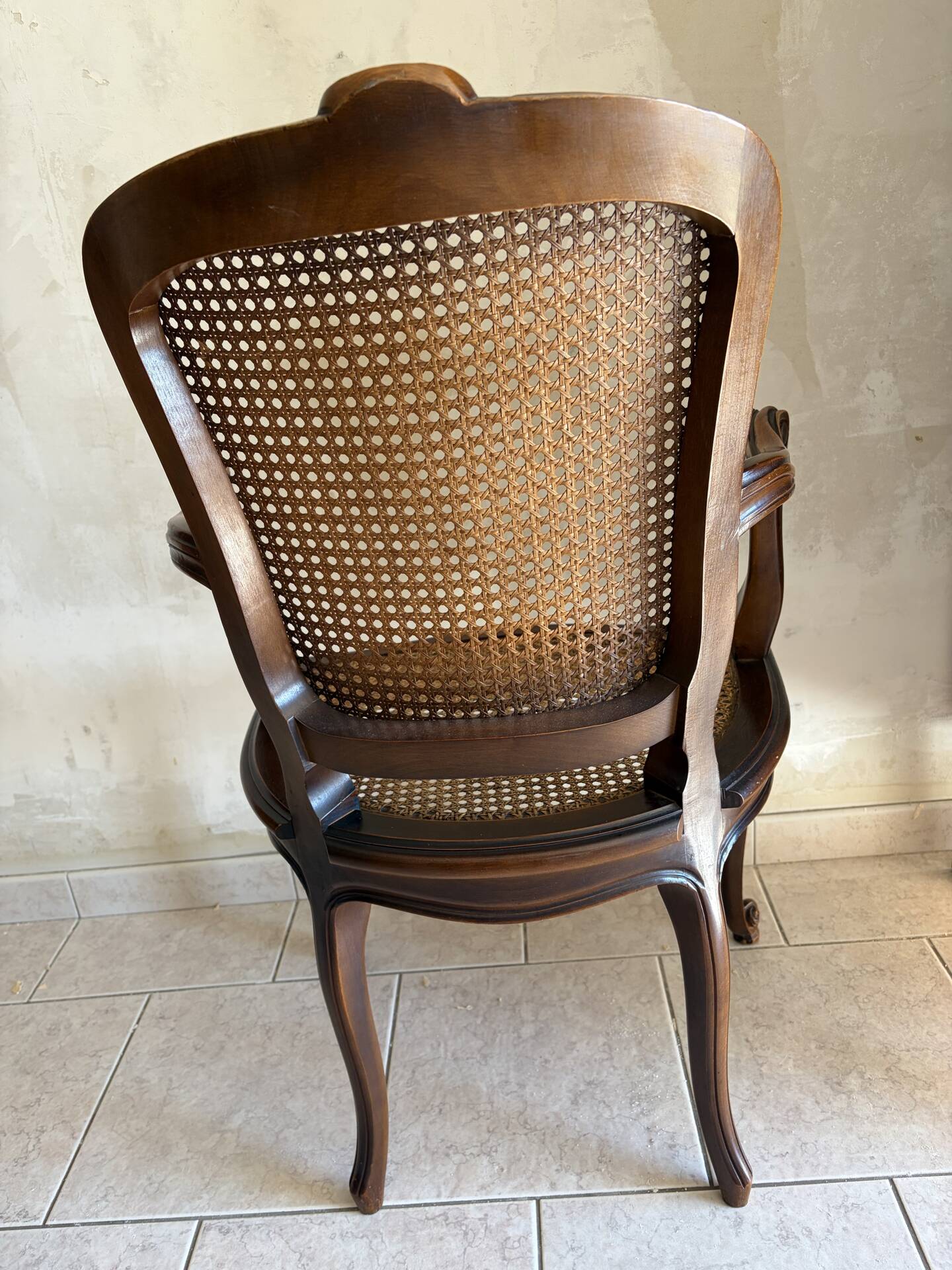 Wood and cane armchair