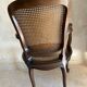 Wood and cane armchair