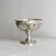 shiny silver metal cup on foot