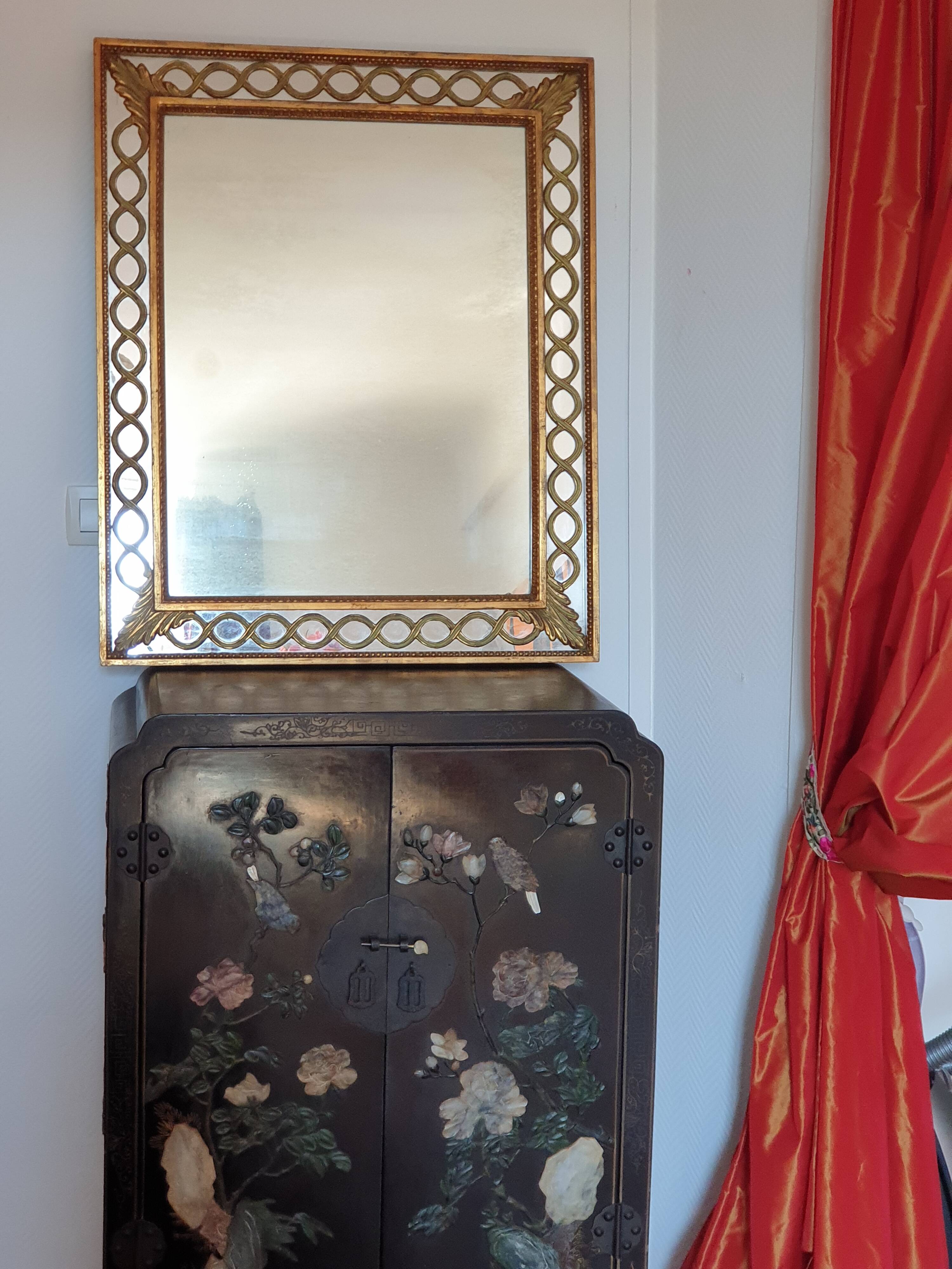 Classic antique mirror in gilded wood