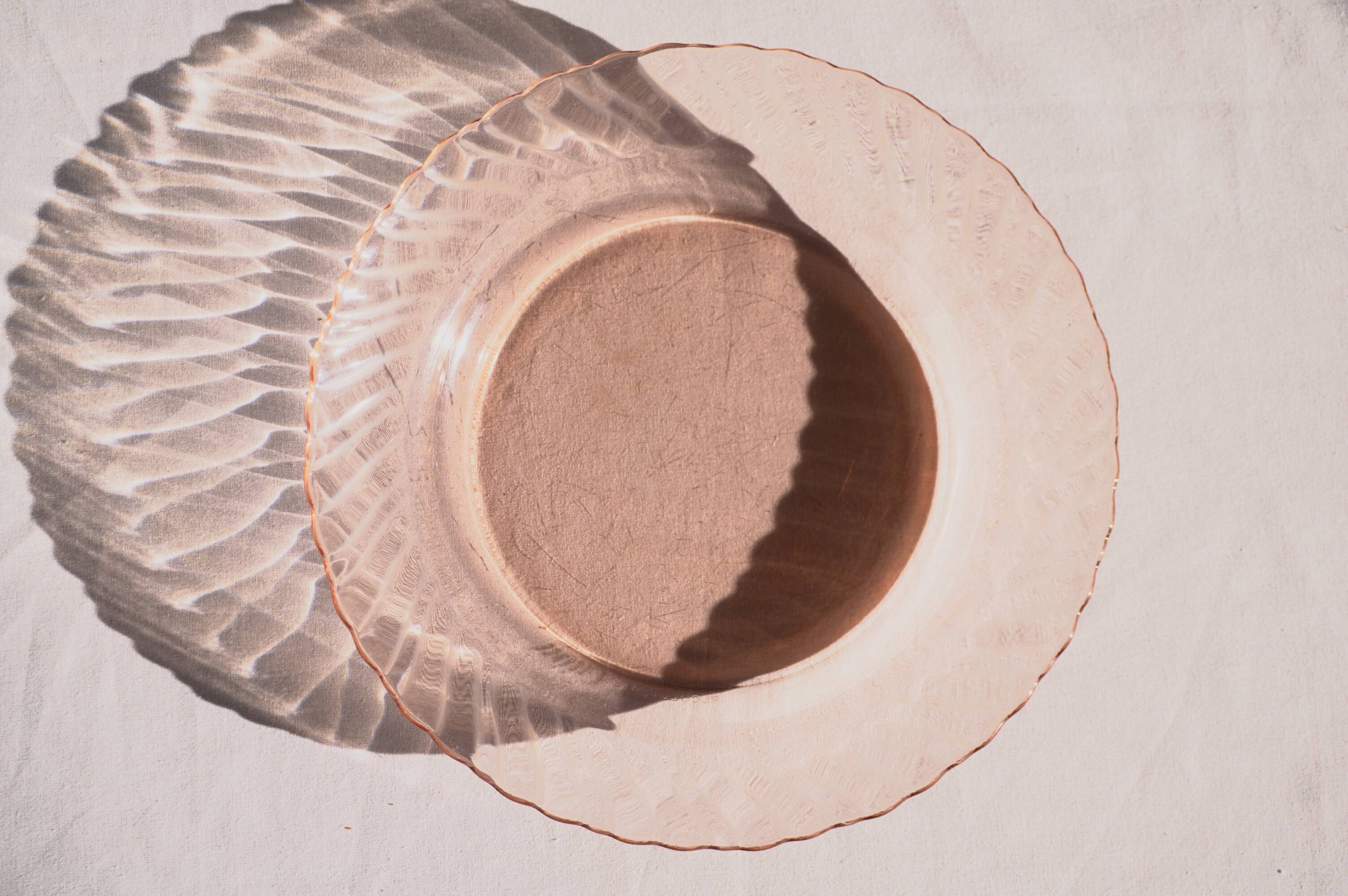 Set of two pink glass plates, Arcoroc France