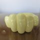 Empty hand-shaped pocket in pale yellow ceramic years70
