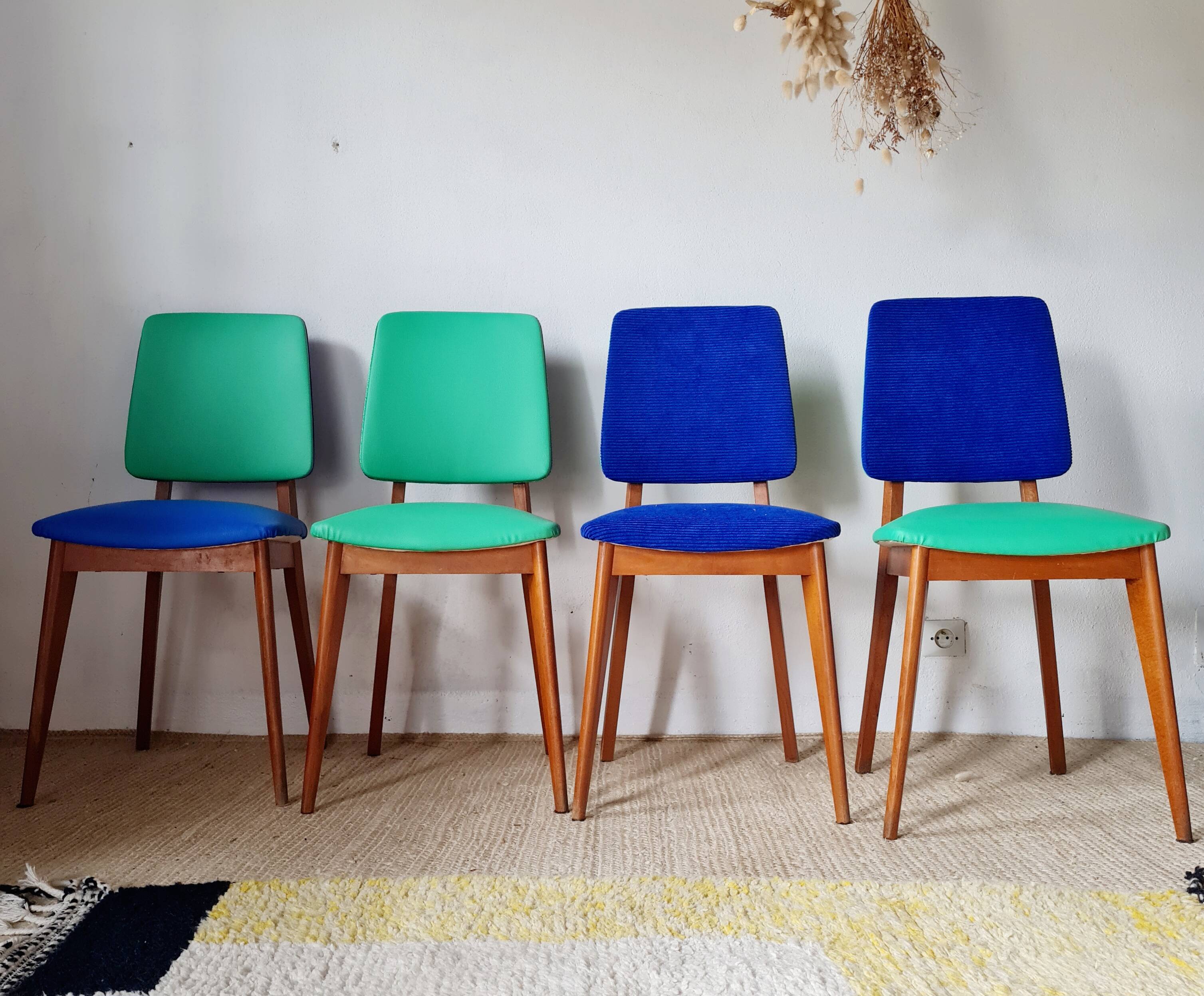 Series of velvet Scandinavian chairs - green and blue.