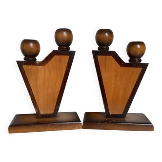 Pair of old asymmetrical wooden candlesticks