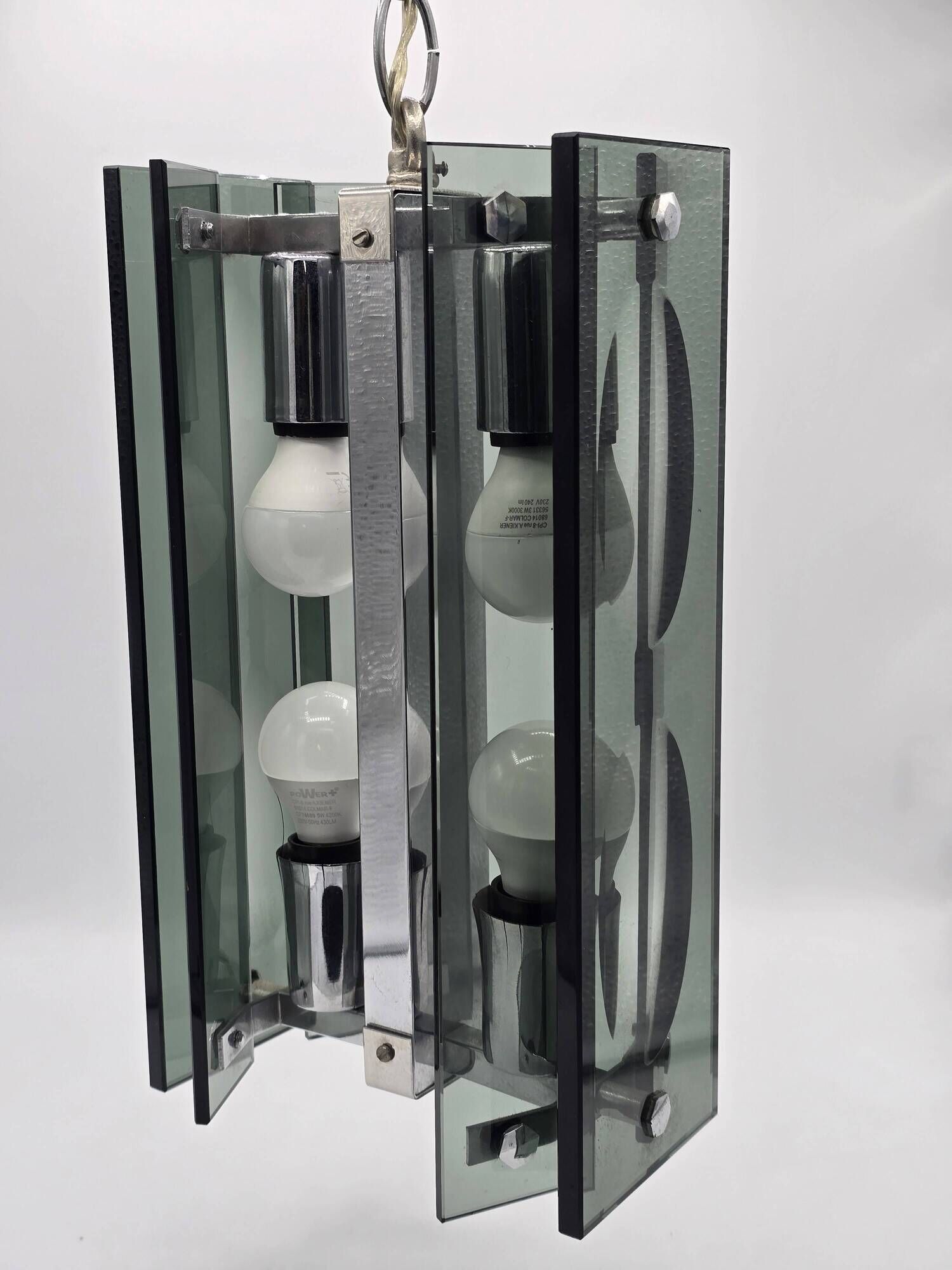 Green-grey glass and chrome metal suspension, in the style of Fontana Arte.