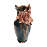 Terracotta vase with a child's head