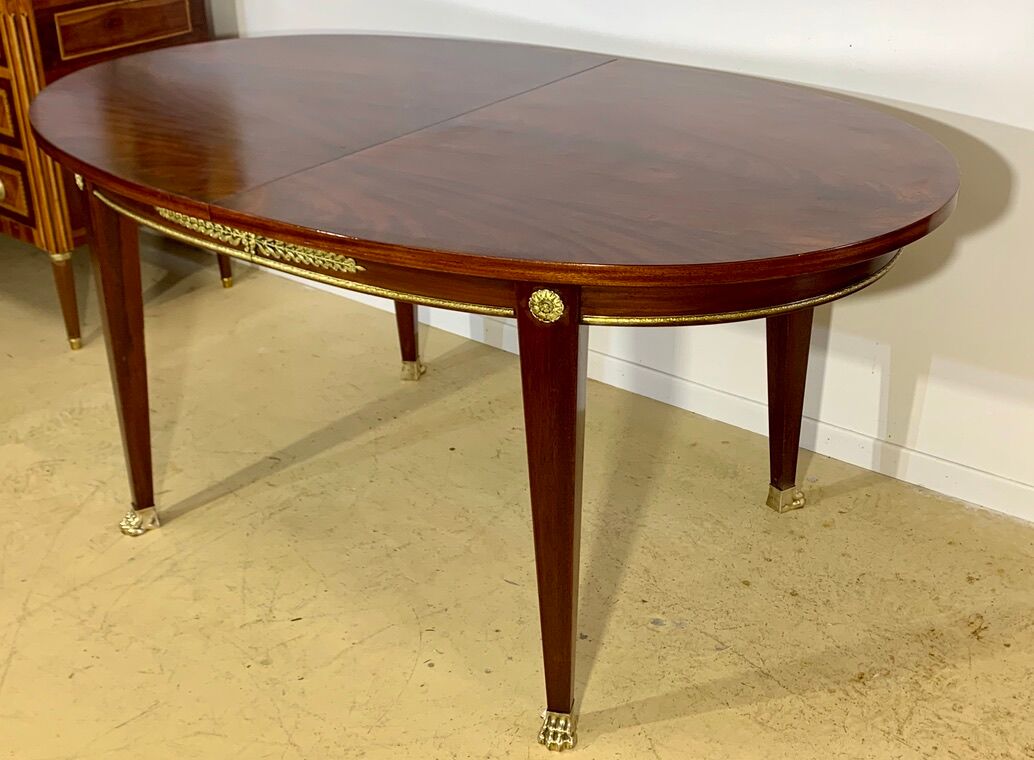 Oval mahogany table Empire style