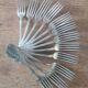 Set of 12 vintage silver-plated metal forks.