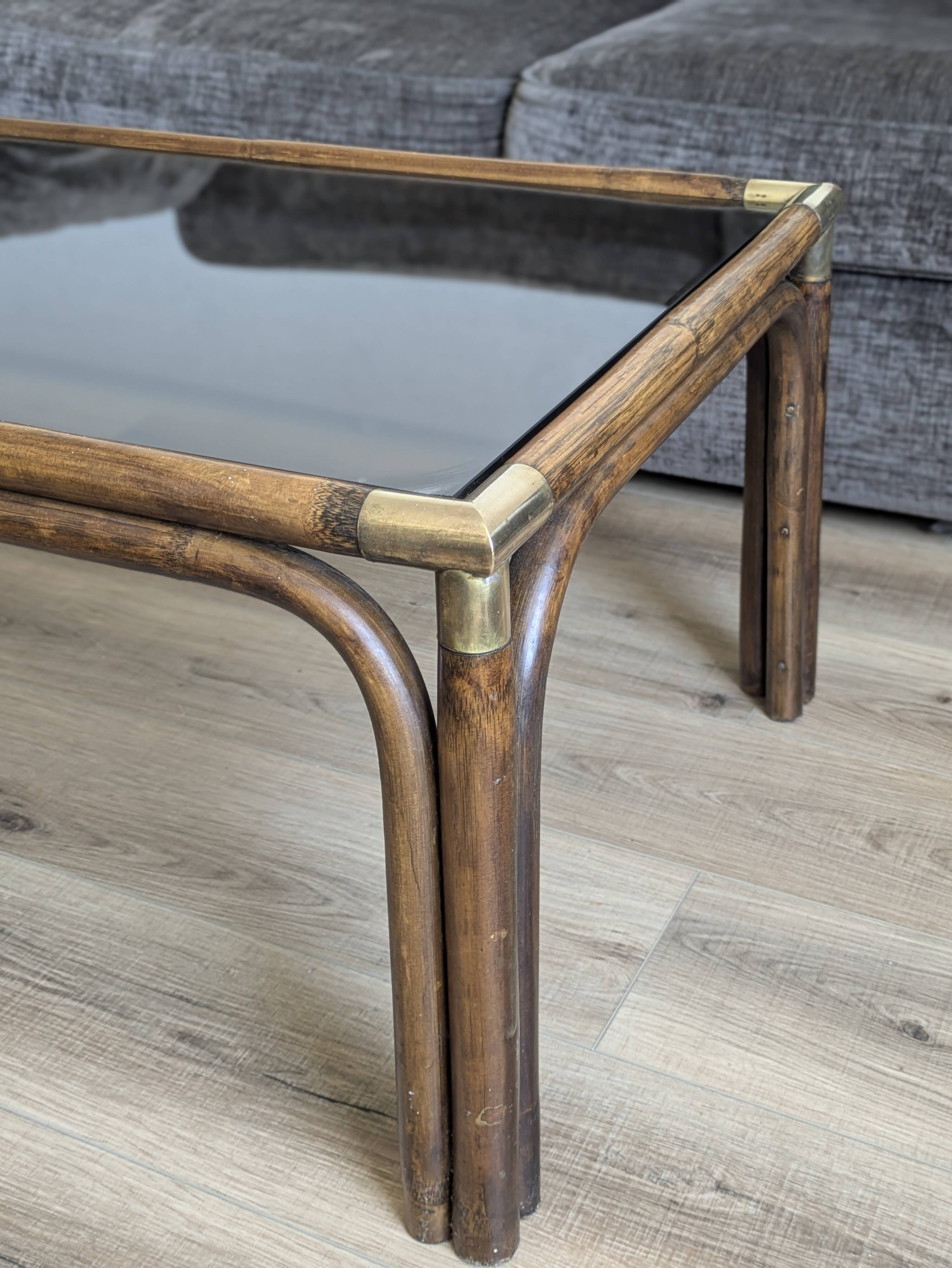 Bamboo coffee table with brass corners and smoked glass