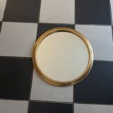 Round golden mirror