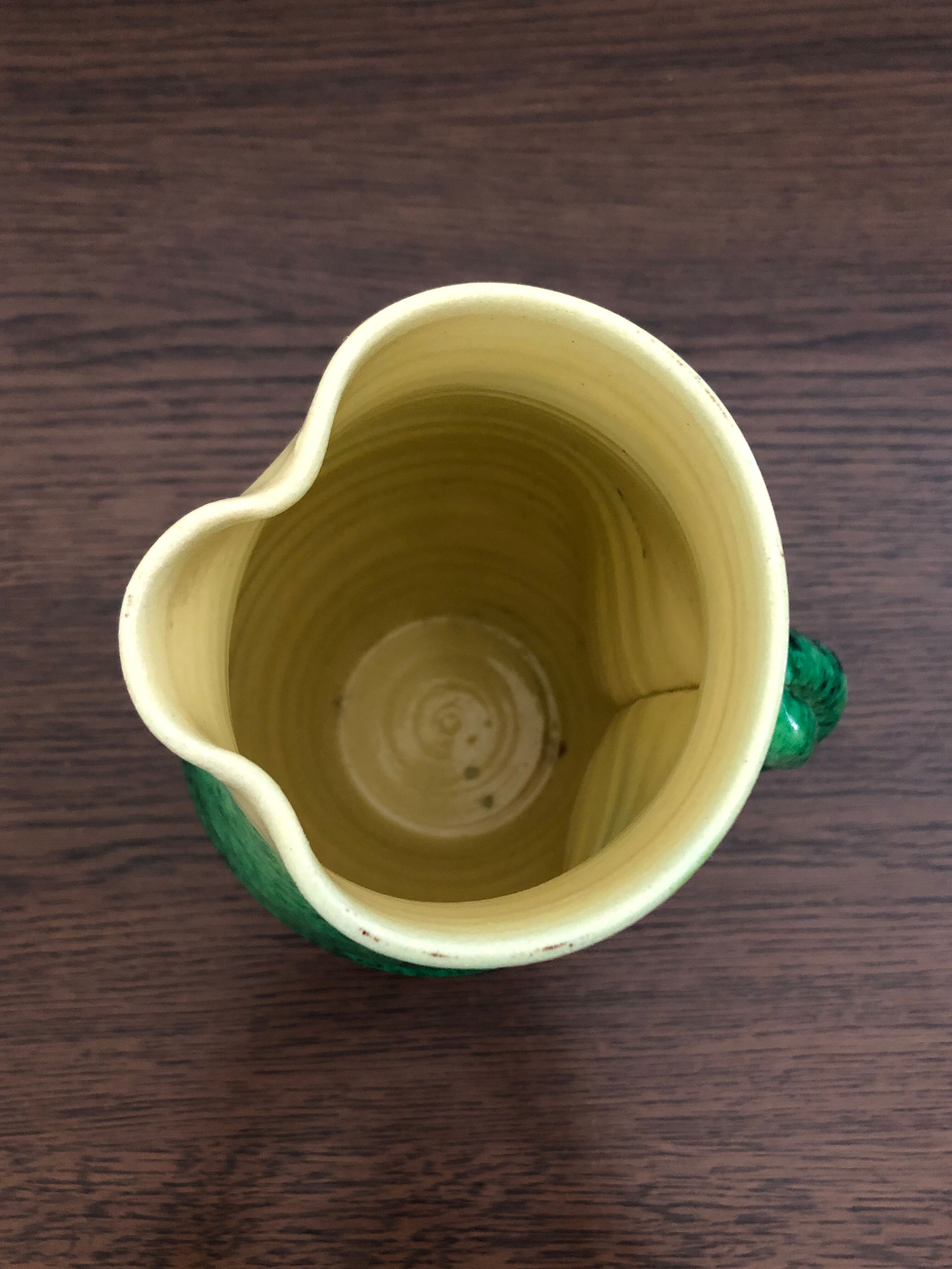 Accolay ceramic pitcher green and yellow speckled with twisted handles, 60s