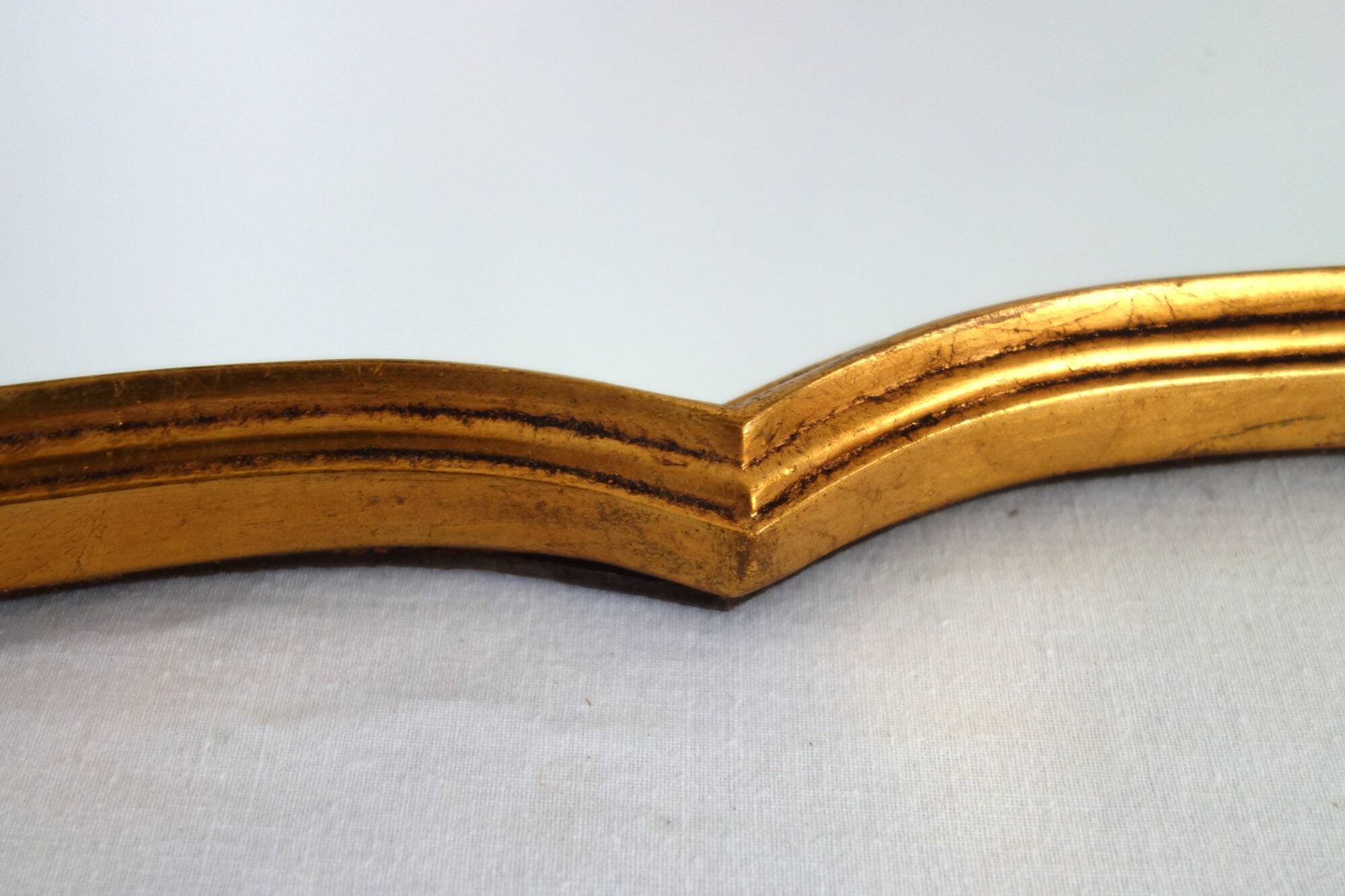 Vintage rocaille or shell gold mirror