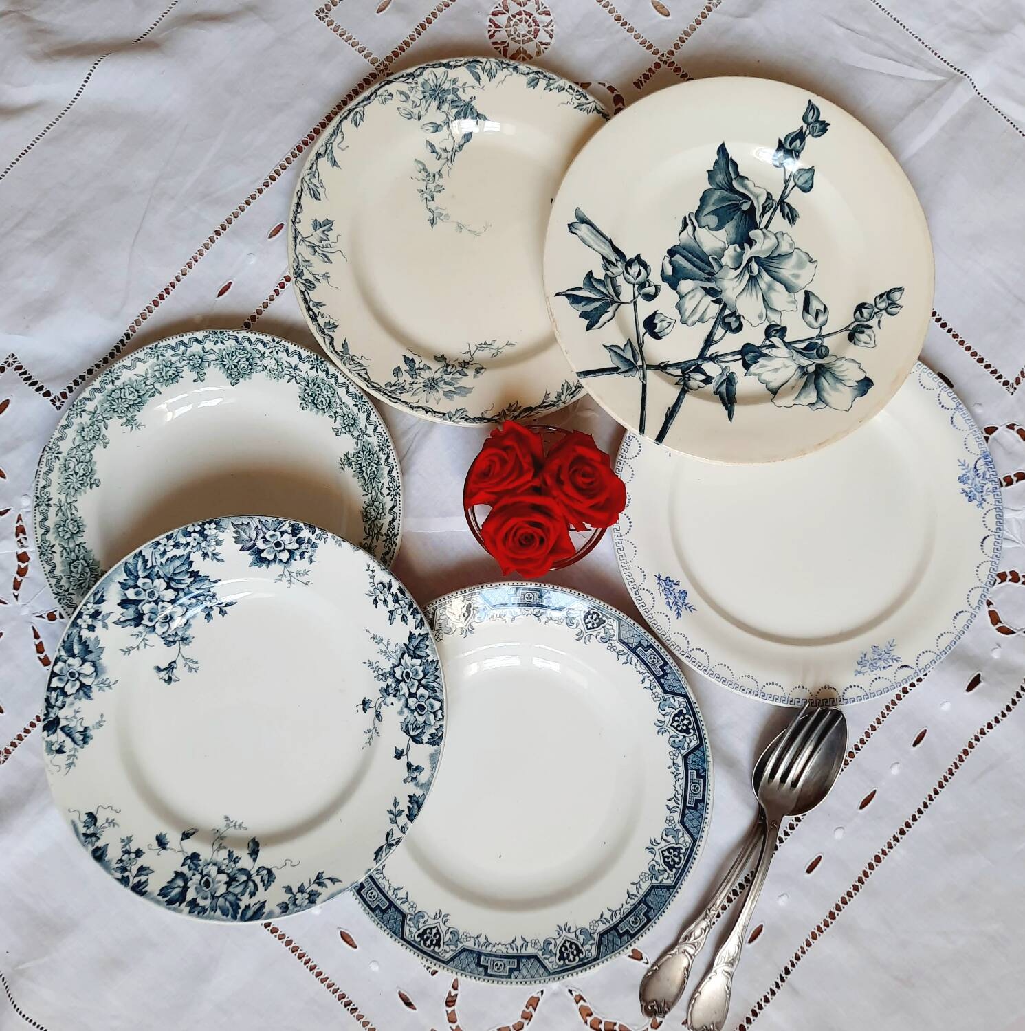 Old mismatched dinner plates accompanied by a dish