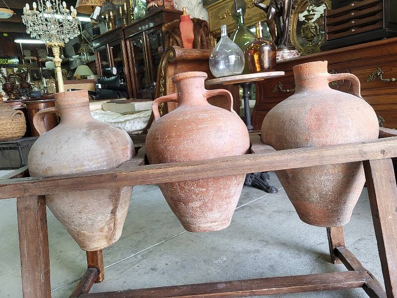 Old wooden jar holder with 3 clay jars