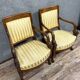 Pair of Empire period mahogany dolphin armchairs