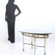 Brass Coffee Table with an Oval Glass Top in the Style of Pierluigi Colli