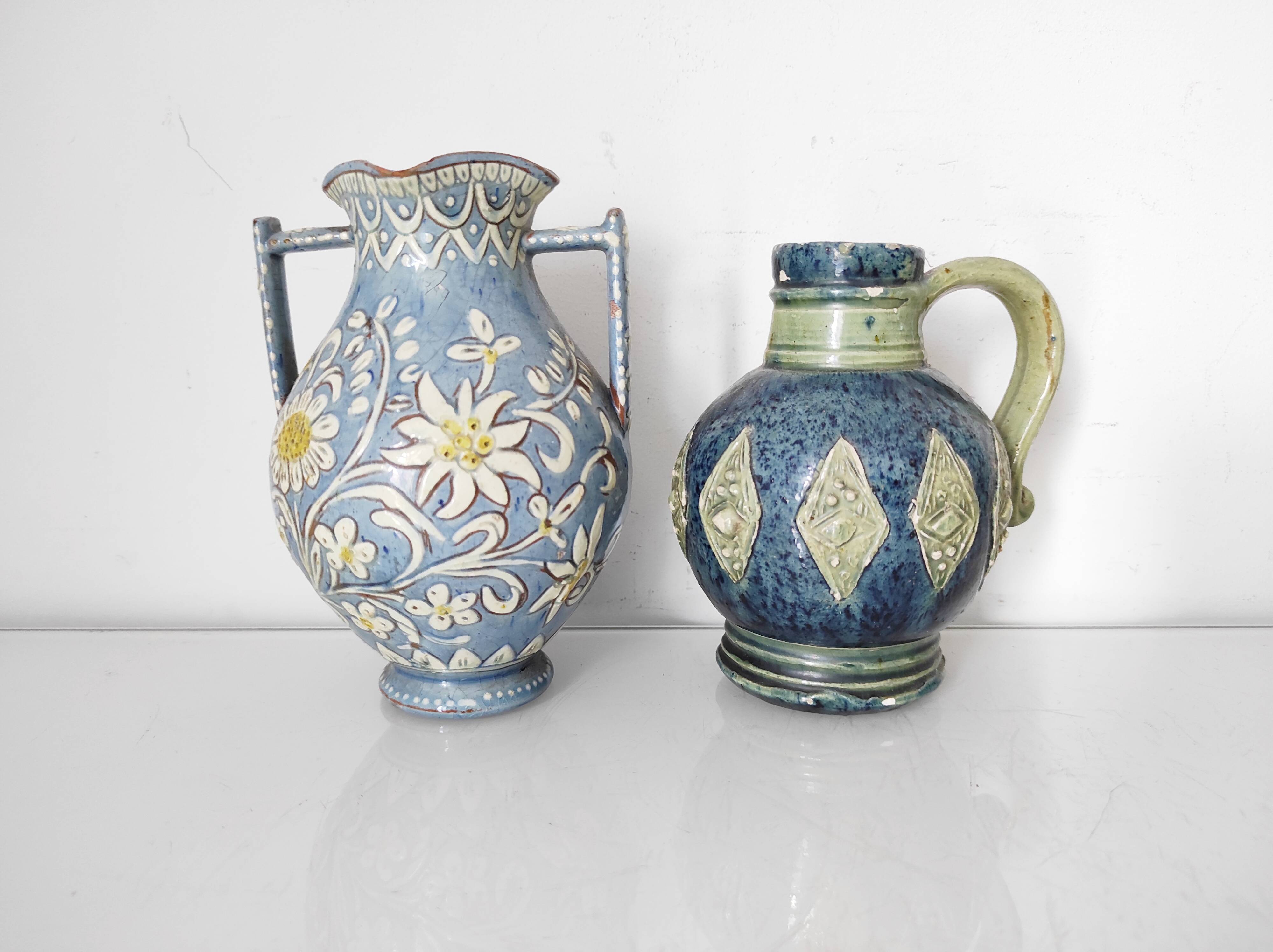 Two small blue ceramic vases